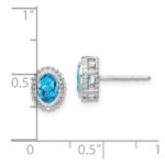 14k White Gold Oval Blue Topaz Post Earrings - Image 4